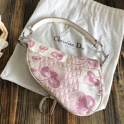 pink christian dior saddle bag